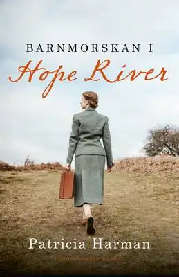 Omslag för Barnmorskan i Hope River