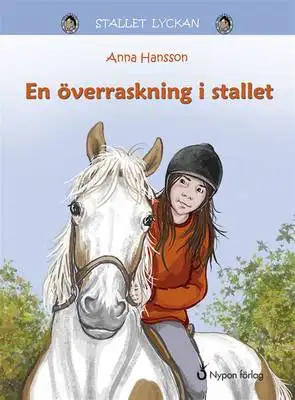 Omslag för En överraskning i stallet